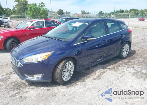 2016 Ford Focus Titanium z USA, uszkodzony, nr VIN 1FADP3N27GL222574